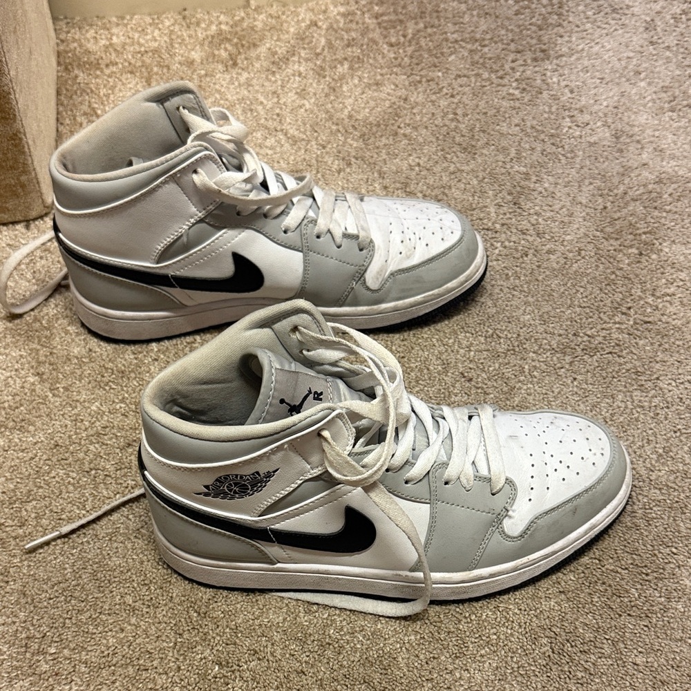Nike jordans White and Gray Sneakers with Black Logo